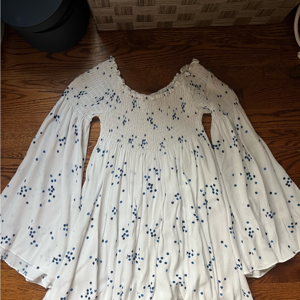 White flowy off the shoulder dress with blue dots